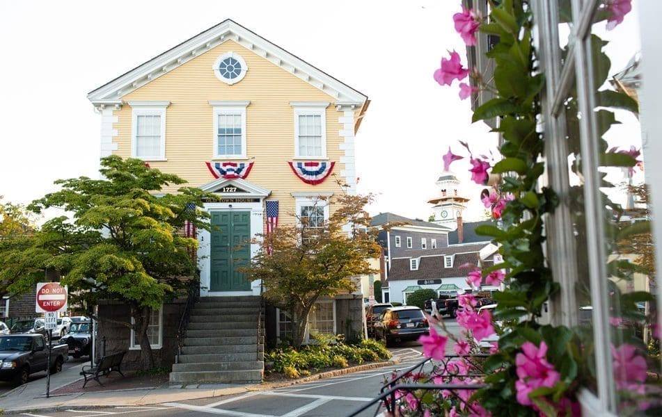 Marblehead MA Old Townhouse Surrounded by Pink Flowers