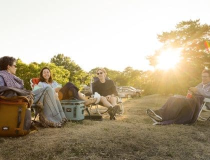 People having a Picnic as the Sun Sets in Promenade Park in Newburyport MA