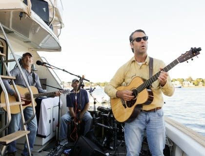 Close-up of Guitarist Performing with his Band on the back of a Boat in Newburyport MA