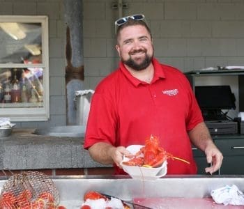 Serving Lobster at Woodman's of Essex in Essex MA