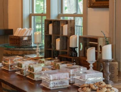 Food station with sandwiches and cookies