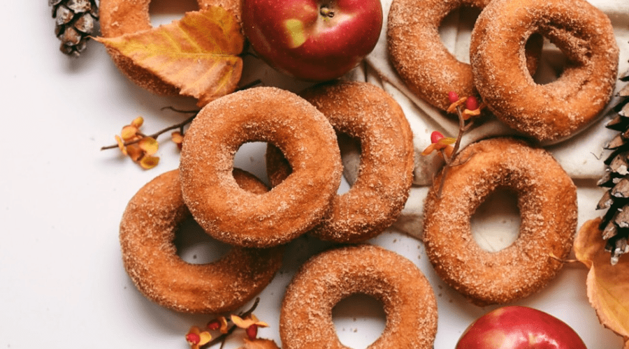 https://cpiofullstackpoc-sitetest.sperlingdev.com/wp-content/uploads/2024/03/Cider-Donuts-with-PineCones-1.png