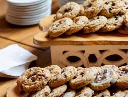 Two trays of chocolate chip cookies