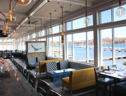 a view of the oceanside seating at mile marker one restaurant in gloucester, ma