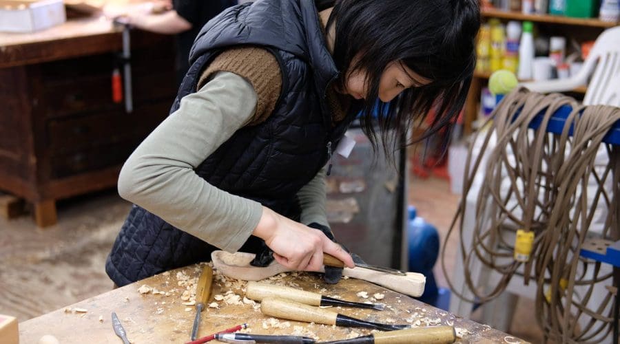 https://cpiofullstackpoc-sitetest.sperlingdev.com/wp-content/uploads/2025/01/StudentSpoonCarving.jpg